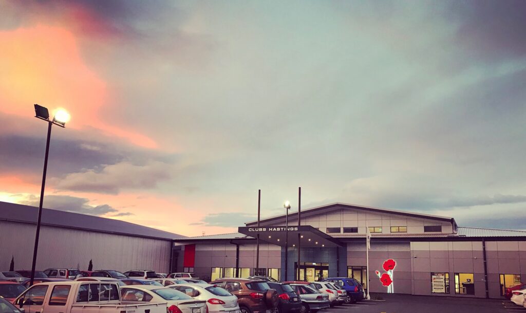 Clubs Hastings building and car park at dusk